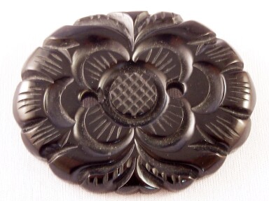 BP41 black bakelite oval flower pin
